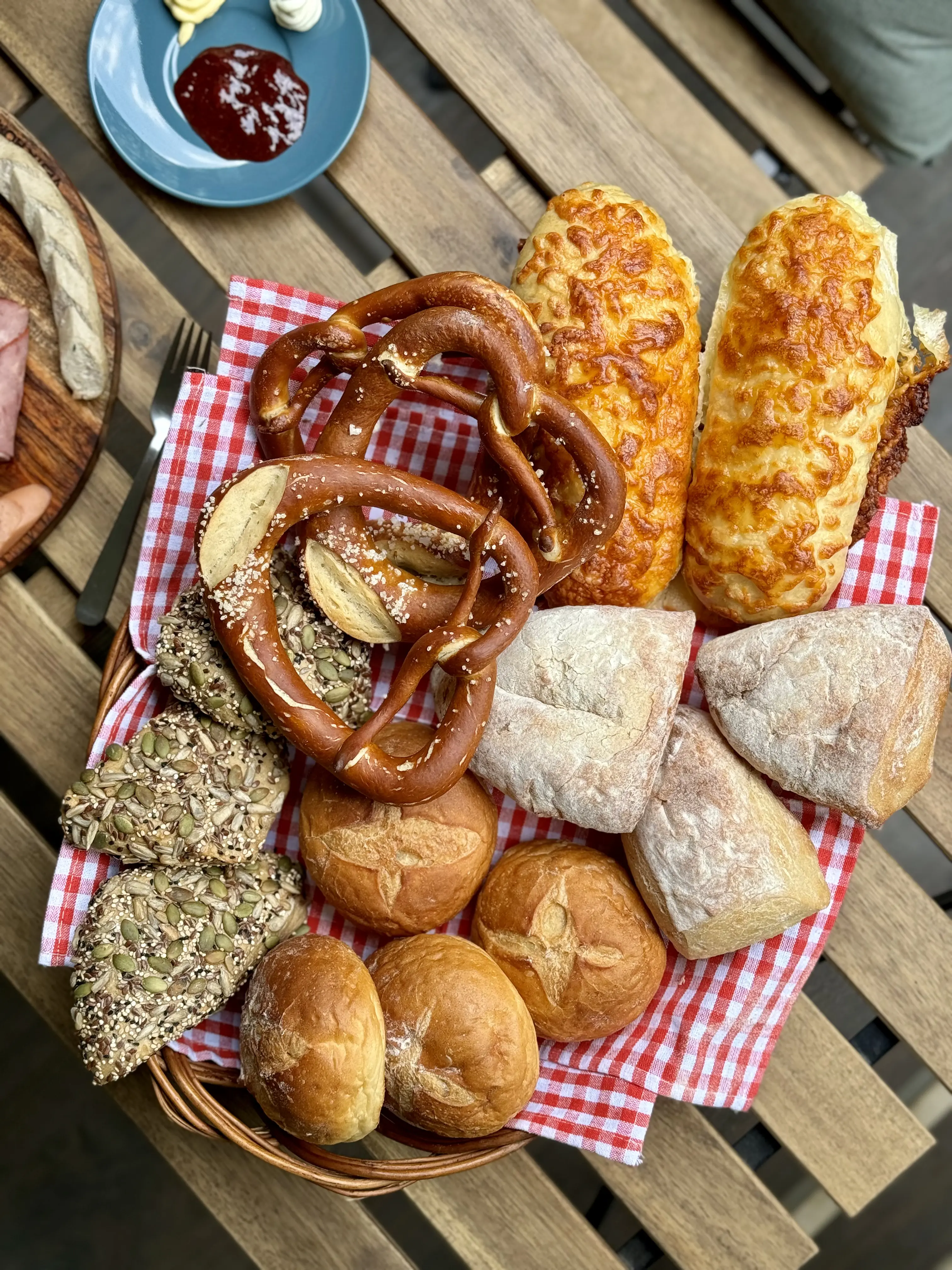 Barista pulling espresso shots beside pastries